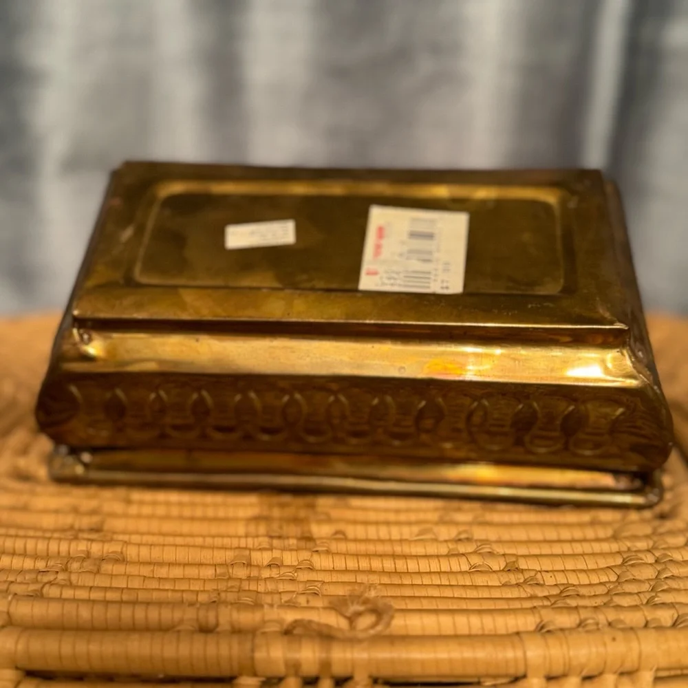 vintage brass planter, also known as a jardinière or cachepot.